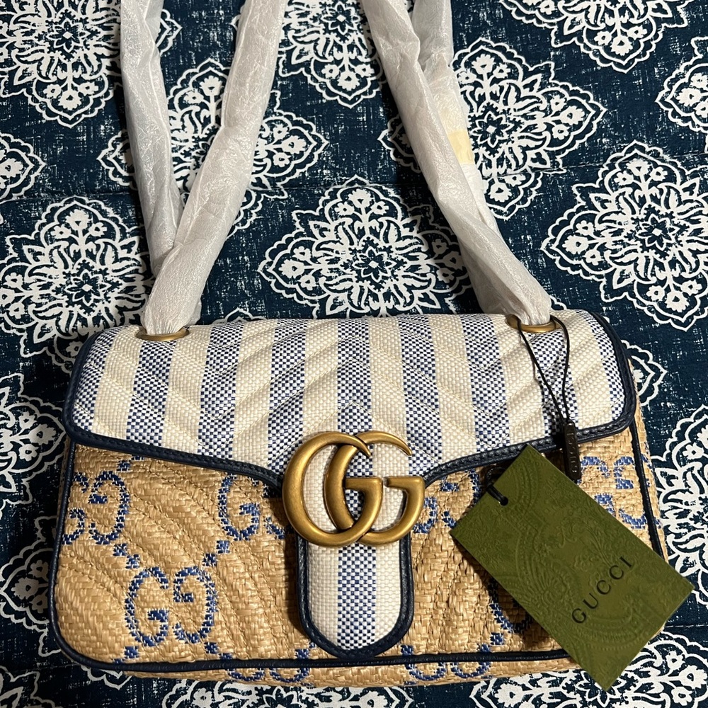 Gucci handbag never worn and tag is still on it.